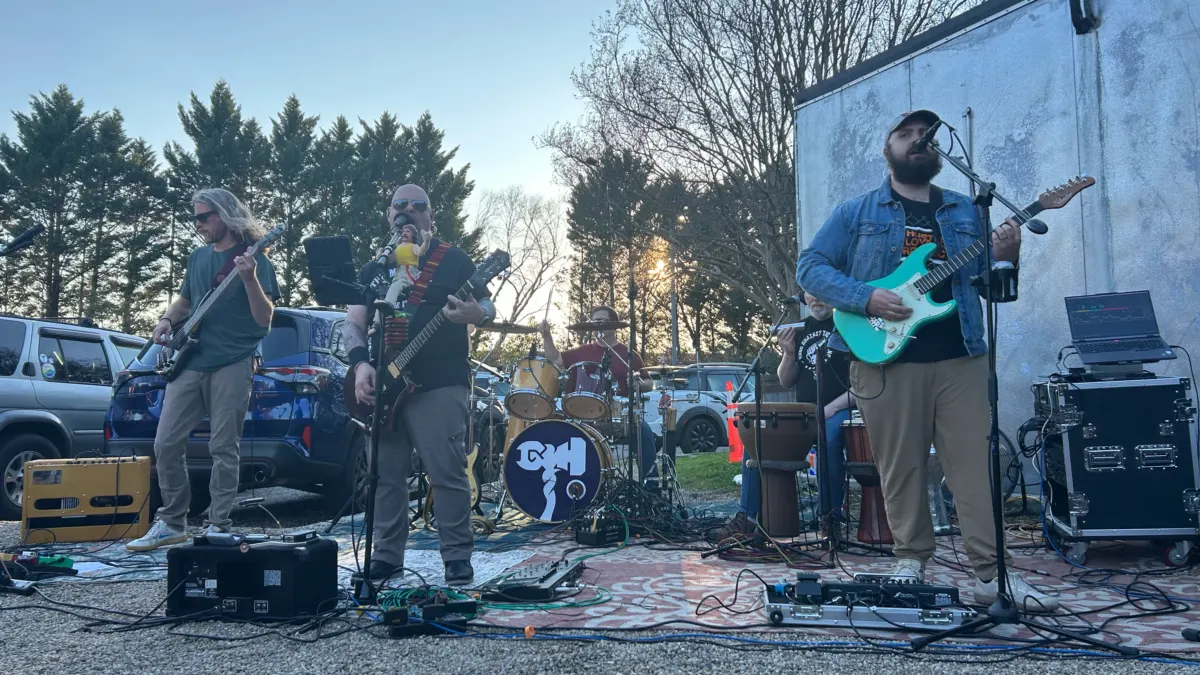 Grabthar's Hammer playing an outdoor gig at sunset